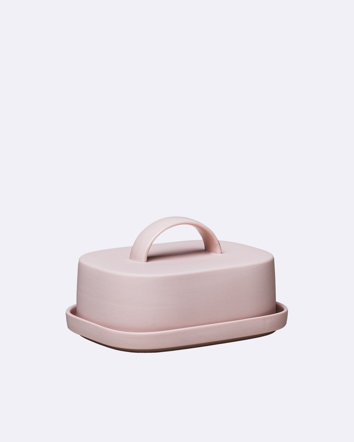 Butterdose aus Porzellan in zartem Rosa ohne sichtbaren Schriftzug