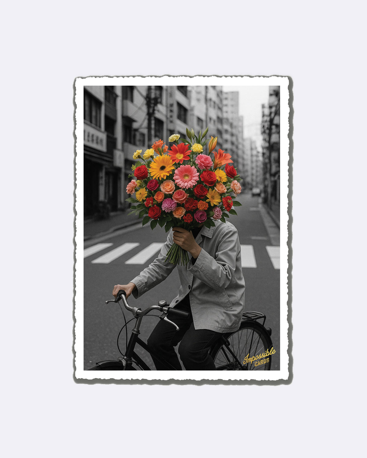 Postkarte mit buntem Blumenstrauß auf einem Fahrrad mit Schriftzug "Impossible Cards"