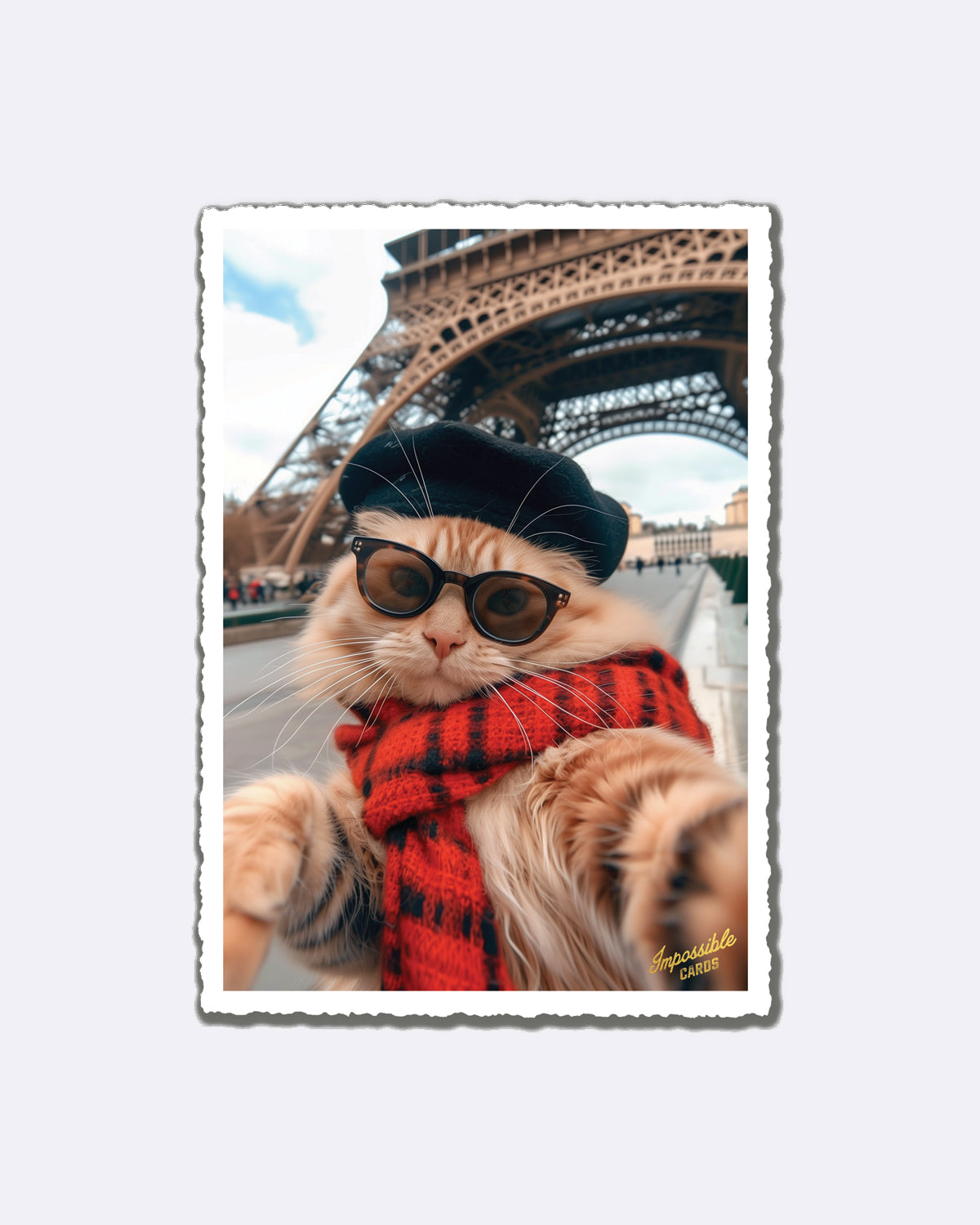 Postkarte mit Katze in Sonnenbrille und rotem Schal vor Eiffelturm und Schriftzug "Impossible Cards"