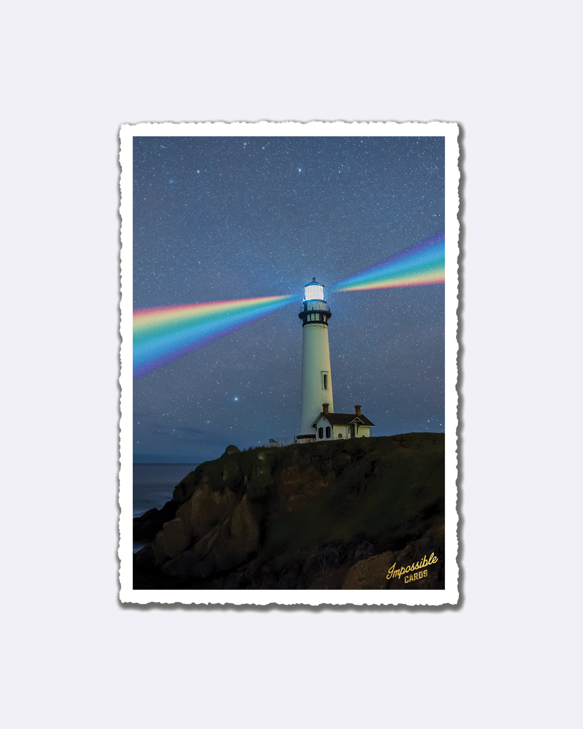 Postkarte mit Leuchtturm und Regenbogenstrahlen vor Sternenhimmel mit Schriftzug "Impossible Cards"