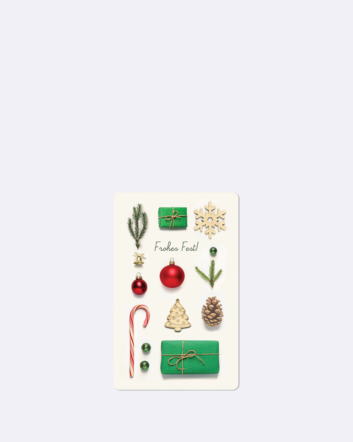Postkarte in weiß mit verschiedenen weihnachtlichen Gegenständen
