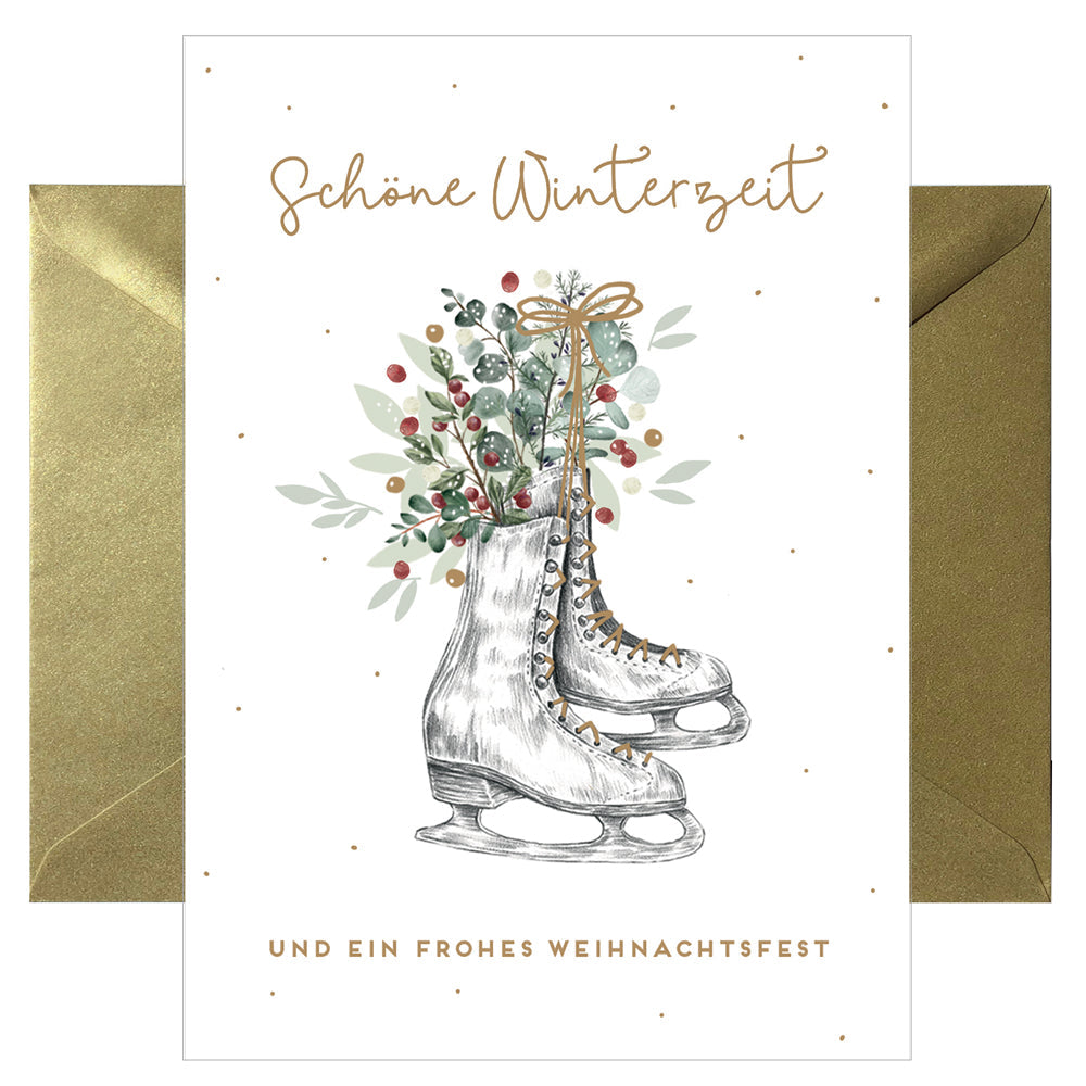 Ausklappbare Postkarte mit Umschlag in weiß mit abgebildeten Schlittschuhen und goldener Schrift