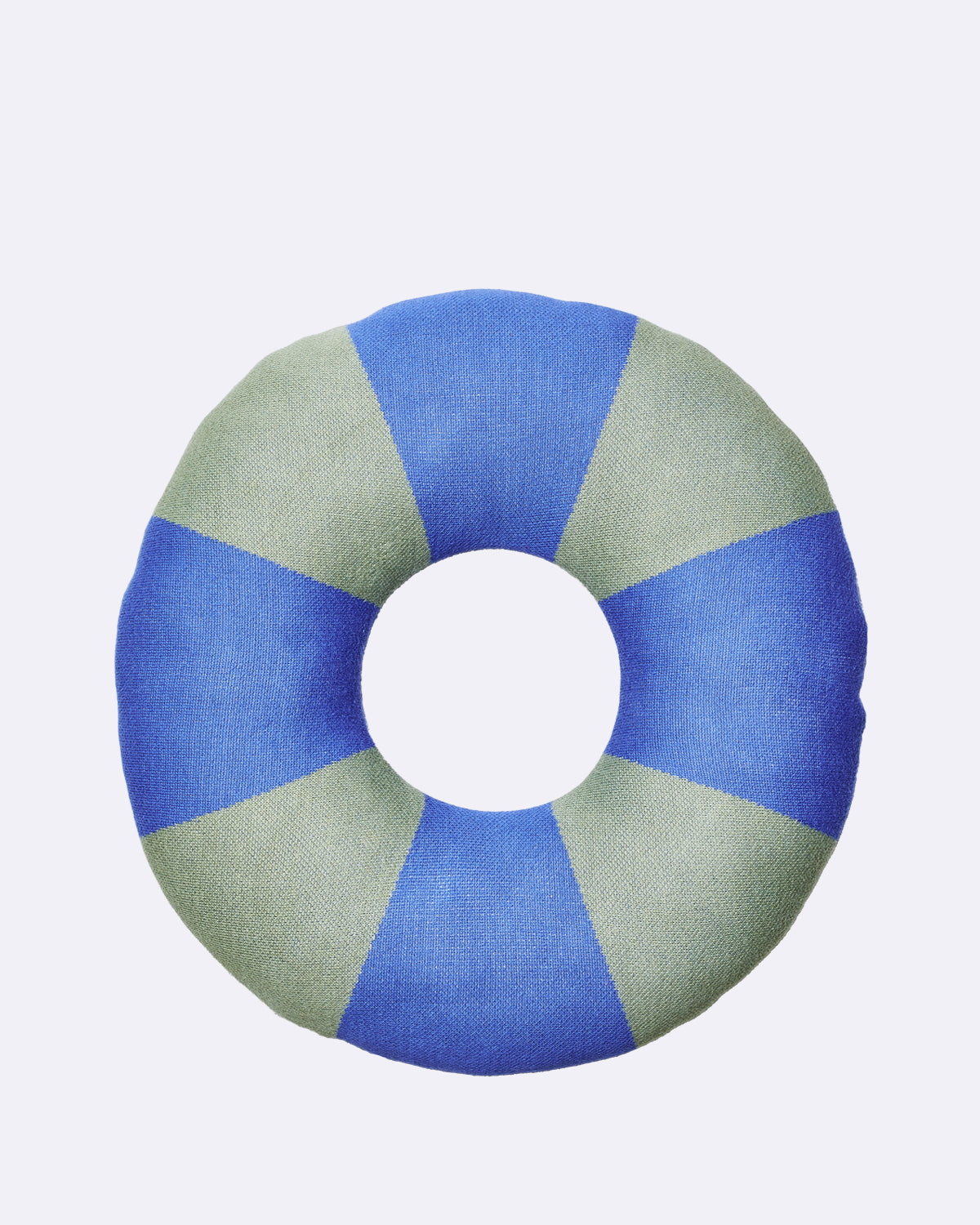 Kissen in Donutform mit blau-grünen Segmenten ohne sichtbaren Schriftzug