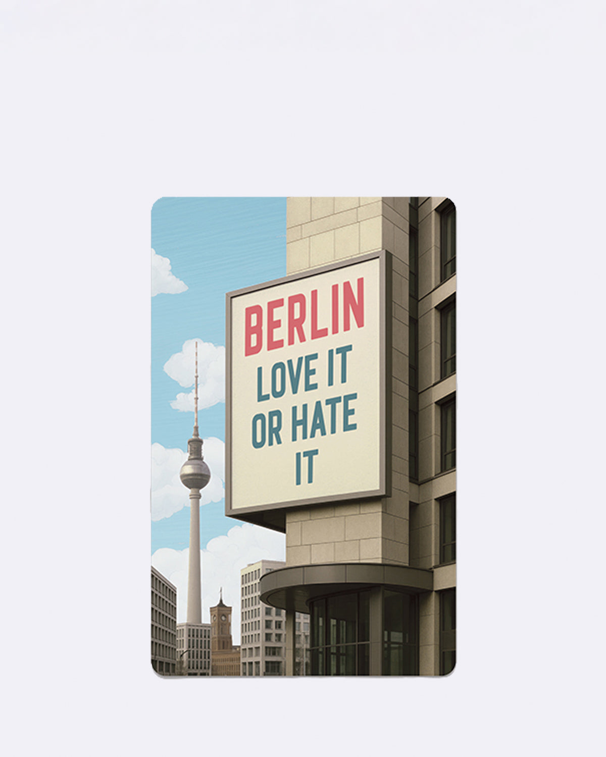 Postkarte mit grauem Gebäude und Fernsehturm vor blauem Himmel mit Schriftzug "BERLIN LOVE IT OR HATE IT"