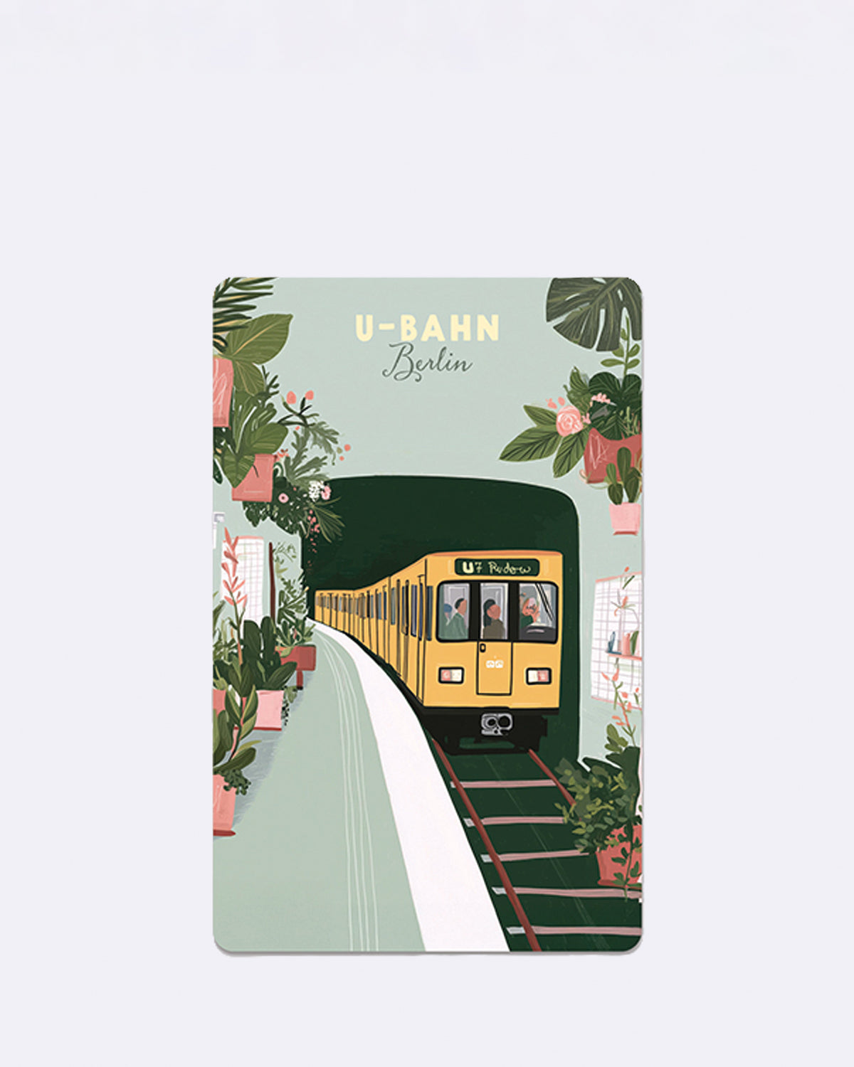 Mini Postkarte mit gelbem U-Bahn-Zug und grüner Pflanzenumgebung mit Schriftzug "U-BAHN Berlin"